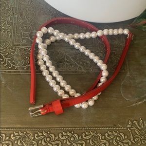 Slim red leather and pearl waist belt